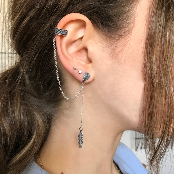 Feather. Mono Ear, Statement cuff earrings. Asymmetrical pair of dangle earrings. Sterling silver 925. Delicate, feminine piece of jewelry.