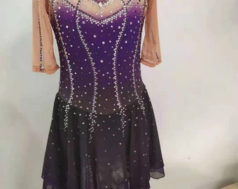 May include: Purple and black figure skating dress with a high neck and long sleeves. The dress is decorated with rhinestones and has a sheer overlay. The dress is on a mannequin and the text "etsy:customicedress" is visible at the bottom of the image.