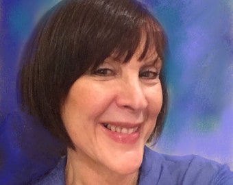 May include: A woman with short brown hair is smiling at the camera. She is wearing a blue shirt and has a blue background behind her.