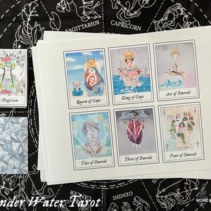 May include: A set of nine tarot cards from the Wonder Water Tarot deck. The cards are printed on white cardstock and feature watercolor illustrations. The cards include The Magician, Queen of Cups, King of Cups, Ace of Swords, Two of Swords, Three of Swords, and Four of Swords.