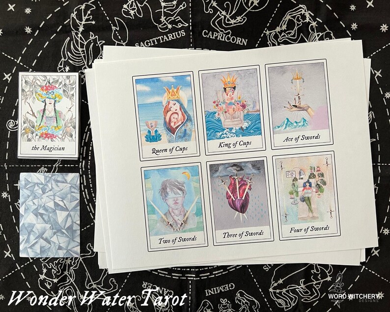 May include: A set of nine tarot cards from the Wonder Water Tarot deck. The cards are printed on white cardstock and feature watercolor illustrations. The cards include The Magician, Queen of Cups, King of Cups, Ace of Swords, Two of Swords, Three of Swords, and Four of Swords.