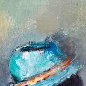 May include: A close-up of a teal blue hat with a light orange and white band. The hat is painted in a textured style.