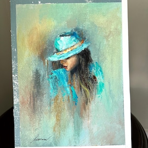 May include: A painting of a woman with long brown hair wearing a turquoise hat and a turquoise shirt. The background is a soft green and blue.
