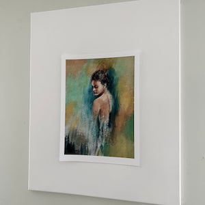 May include: A framed painting of a woman with dark hair and a blue and green background.