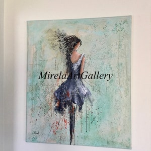 May include: Abstract painting of a woman in a blue dress with her hair blowing in the wind. The background is a textured green and blue with splashes of red and orange. The painting is signed "Sorela" in the bottom left corner and "Mirela Art Gallery" in the bottom right corner.