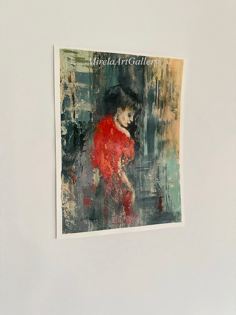 May include: A painting of a woman in a red dress, with a textured background in shades of blue, gray, and brown. The woman is looking down, and her hair is dark. The painting is signed "Mirela Art Gallery".