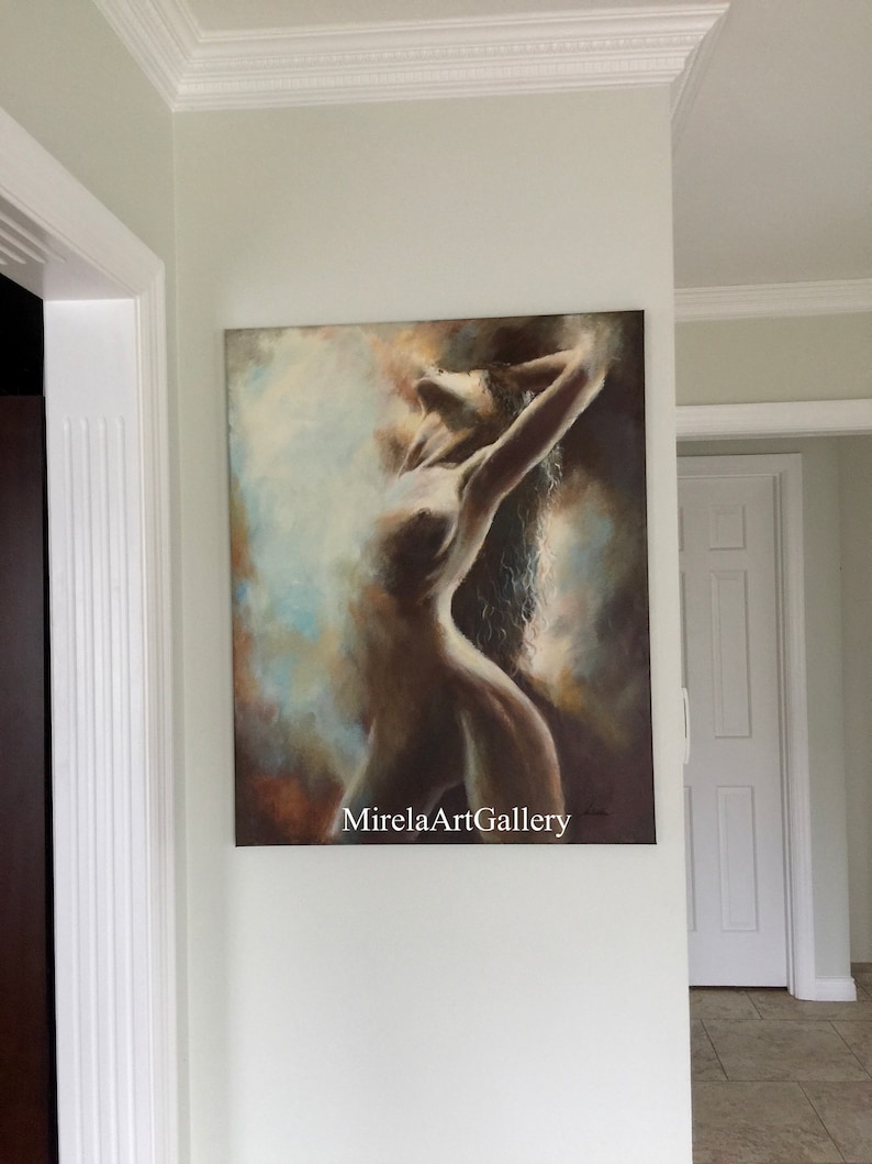 May include: A painting of a nude figure with long hair, standing with arms raised, against a background of soft, muted colors. The painting is signed "MirelaArtGallery".