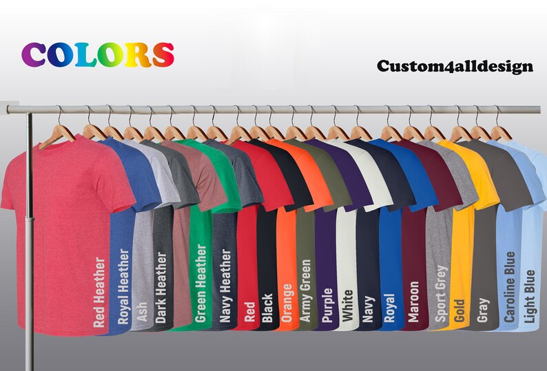 May include: A display of various colored t-shirts hanging on wooden hangers. The shirts are in a variety of colors, including red, blue, green, black, and orange. The word "COLORS" is at the top left, and "Custom4alldesign" is at the top right.