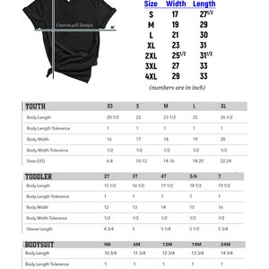 May include: Black t-shirt with a size chart for unisex t-shirts, youth, toddler, and bodysuit sizes. The chart includes measurements in inches for width and length, with sizes ranging from S to 4XL for shirts and NB to 24M for bodysuits.