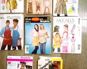 Aprons!  men and misses  sizes small, med, and large UNCUT