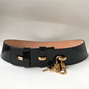 Authentic Vintage Salvatore Ferragamo wide hip belt with lock and keys.