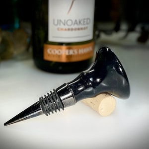 Hand made bottle topper custom designed lathe turned from high quality slow casting epoxy resin Black.