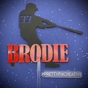 May include: A black silhouette of a baseball player wearing a jersey with the number 33, holding a bat. The name "BRODIE" is in red letters below the player. A white rectangle with the text "#PRETTYFIXCREATIVE" is at the bottom of the image.