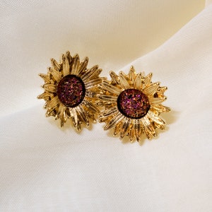 Orecchini a cerchio con fiore in argento sterling