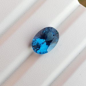Topaze bleue suisse naturelle, topaze bleue de forme ovale, 14 x 10 mm, 7,75 carats, topaze bleue de qualité supérieure, pierre précieuse en vrac pour la fabrication de bijoux