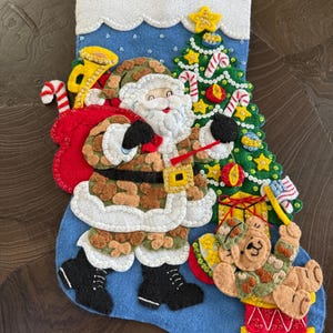 Finished Bucilla stocking in pattern “Camo Santa”