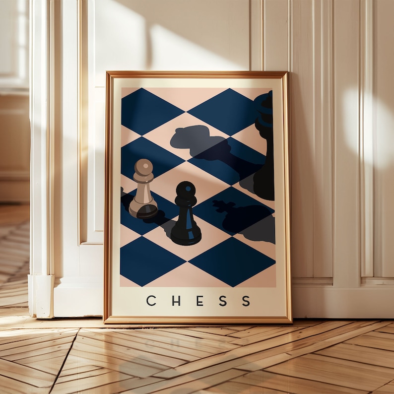 May include: Framed art print featuring a chess-themed design. The artwork showcases a chessboard pattern in navy blue and light pink, with chess pieces casting shadows. The word "CHESS" is printed at the bottom.