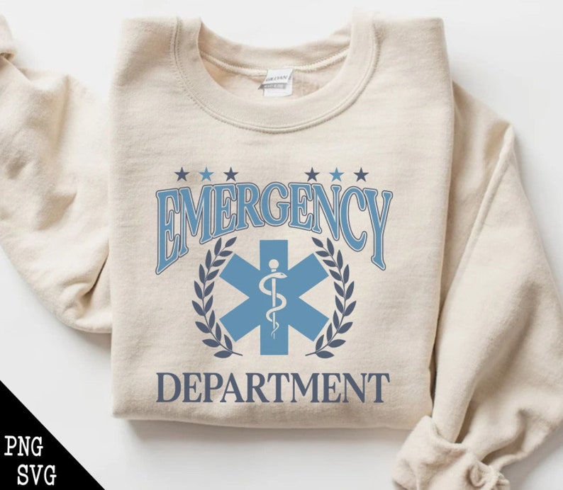 May include: A beige sweatshirt with a blue and white graphic design that says "Emergency Department" with a star of life symbol.