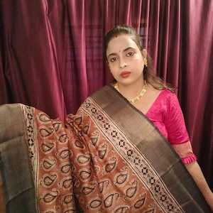 Silkmark certified tussar silk saree over hand ajrakh print with jari border and running blouse piece