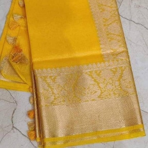 Exclusive silk linen banarasi with hand weaving work and running blouse for party wear saree
