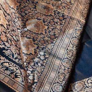 Exclusive soft silk over coper and multi color reshom thread work over pallu and body with plain black body for party wear,summer wear saree