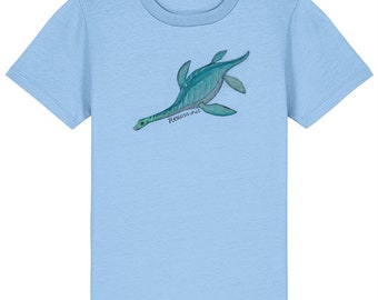 May include: Light blue t-shirt with a green and blue illustration of a Plesiosaurus, a prehistoric marine reptile, with the word "Plesiosaurus" written below the illustration.