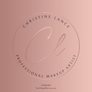 May include: A pink and white logo with the text "Christine Lance Professional Makeup Artist" in a circle around the letters "CL" in a script font.