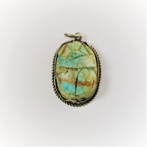 Scarab Amulet And Sterling Silver Rope Edge Pendant, each item is one of a kind