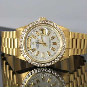 Montre-bracelet Rolex President en or jaune 18 carats et diamants