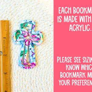 May include: A floral patterned cross bookmark made from 1/8 inch acrylic. Each bookmark is made with 1/8" acrylic. Please see sizing to know which bookmark meets your preferences.