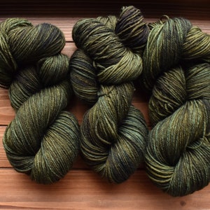 Fern Cliff: Dark Olive Green Yarn. Hand-dyed Wool Yarn. Tonal green yarn. Earthy Moss Green. Army green. Loden. Forest green. Semi-solid.