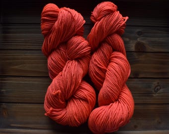 Coral: Hunter's orange. Salmon. Hand-dyed Wool Yarn. Neon pink orange yarn. Neon yarn. Fluorescent orange. Variegated. Hot orange. Sunset.