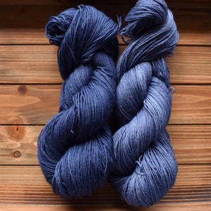 Starry Night: Purplish Blue Hand-dyed Merino Wool Yarn. Dark Periwinkle. Tonal purple blue yarn. Midnight. Semi-solid yarn.