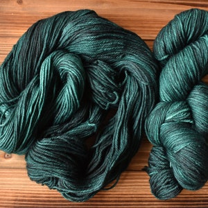 Hemlock Bluffs: Forest Green Hand-dyed, Merino Wool Superwash Fingering Sock Yarn. Tonal green yarn.  Semi-solid yarn. Emerald green yarn.