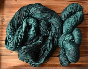Hemlock Bluffs: Forest Green Hand-dyed, Merino Wool Superwash Fingering Sock Yarn. Tonal green yarn.  Semi-solid yarn. Emerald green yarn.