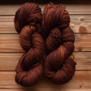 Umber: Hand-dyed Chestnut Yarn. Spice. Rust. Sienna. Burnt umber. Tonal brownish orange yarn. Semi-solid yarn. Fall yarn