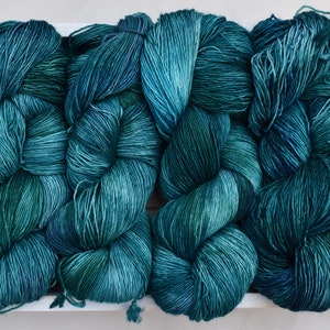 Inverness: Hand-dyed Superwash Merino Wool Fingering Sock Yarn. Tonal. Green. Blue. Teal yarn. Turquoise. Knitting. Semi-solid teal yarn.