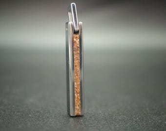 Colgante de tungsteno con forma de hueso de Triceratops