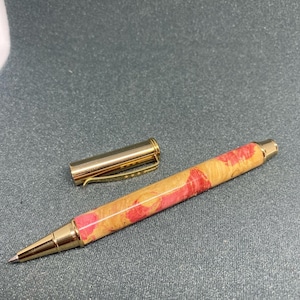 Roze doos oudere burl rollerball