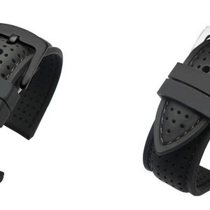 Peut inclure: Deux bracelets de montre noirs avec un design perfor&eacute; et une boucle argent&eacute;e. Les bracelets ont une finition textur&eacute;e, semblable au caoutchouc.