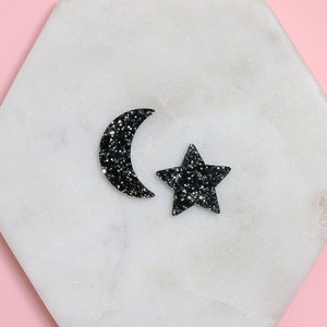 Black Glitter moon and star studs image 1