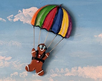A Red Parasail With A Red And Green Parachute | Premium AI-generated Vector
