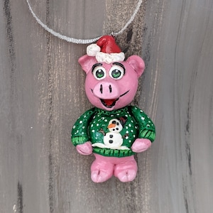 Piggys erstes Weihnachtsfest (Ornament)
