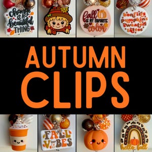 May include: A collection of eight decorative clips featuring autumn-themed charms including a scarecrow, a pumpkin, a coffee cup, and a rainbow. The charms display text such as Change is a beautiful thing, Fall is my favorite color, Bonfires pumpkins sweaters lattes, and Fall vibes.