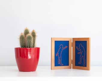 Disturbing embroidery art in frame, fighting people, re-used, recycled frame, weird embroidery, funny gift, wall art, arguing humans
