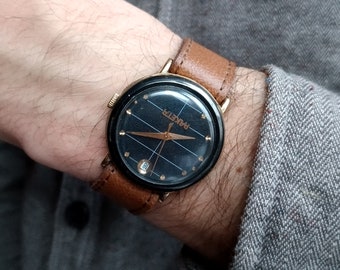 Men mechanical Wrist Watch Raketa Rocket 2614 H Black dial Calendar (USSR Petrodvorets 1980s) 19 jewels