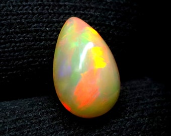 Natural Multi Fire Opal Cabochon Gemstone Pear Shape Opal Ring Size Loose Gemstone Ethiopian Opal Wholesale Price. 3.10 CRT