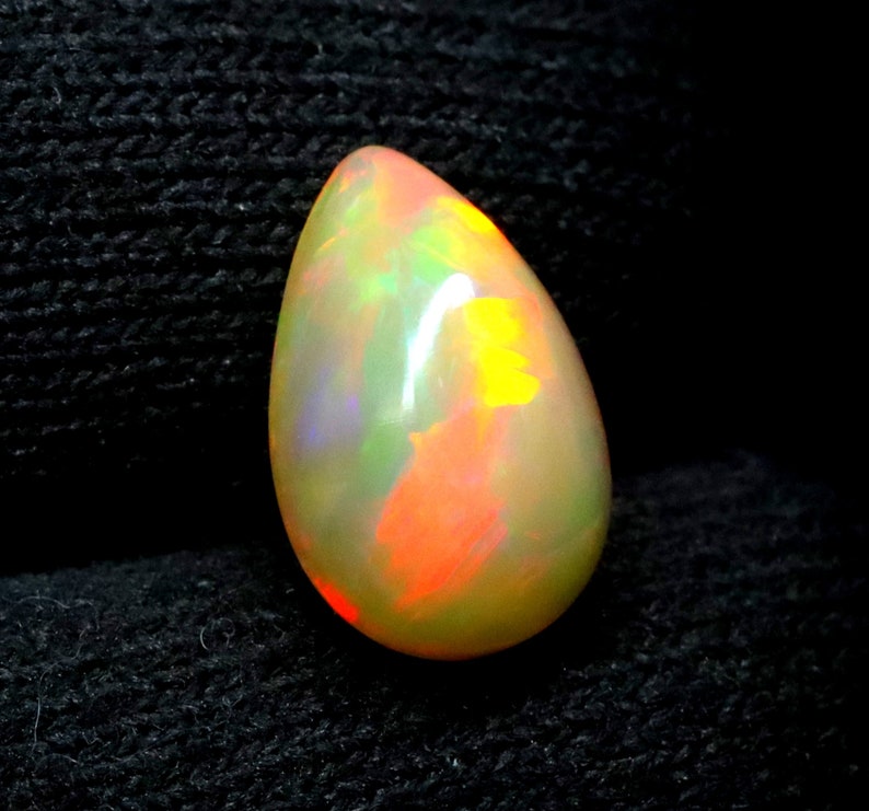 Natural Multi Fire Opal Cabochon Gemstone Pear Shape Opal Ring Size Loose Gemstone Ethiopian Opal Wholesale Price. 3.10 CRT image 1