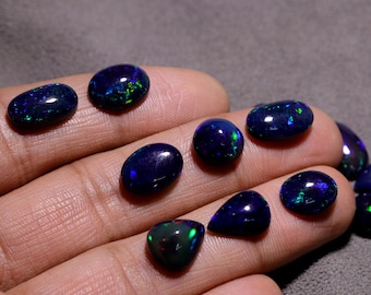 Etiopski czarny opal kaboszonowy: Welo Fire Opal Mix