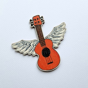 Brooch UKULELE with wings *DIFFERENT COLOURS*, laser cut wood - laserleikattu puinen Ukulele *eri värit* rintaneula